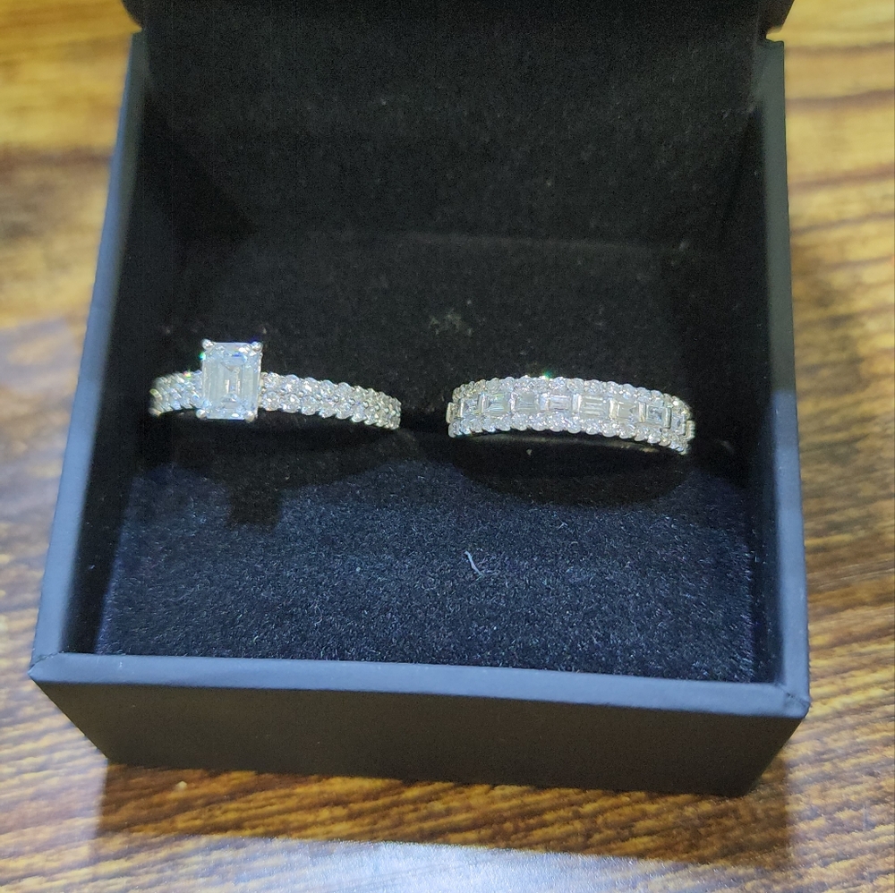 1-1/4 CT. T.W. Certified Emerald-Cut  Diamond Eng ring plus 1 CT. TW Band